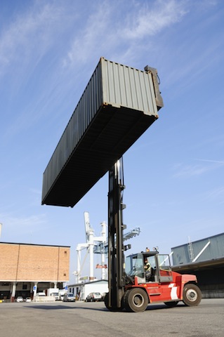 Lagerek, C. Forklift truck lifting large container high in the air. Shutterstock.com. Retrieved February 2nd, 2013, from http://www.shutterstock.com/pic.mhtml?id=5677750